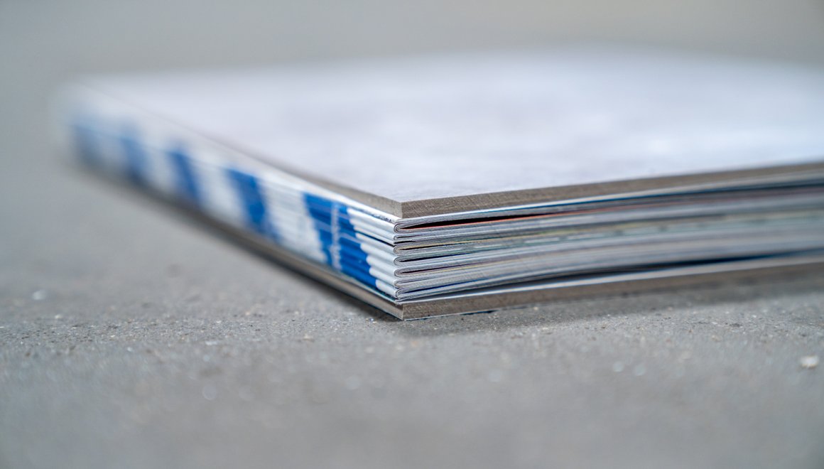 GigantPrint - Solid brand-identitet støbt i papir og betonæstetik